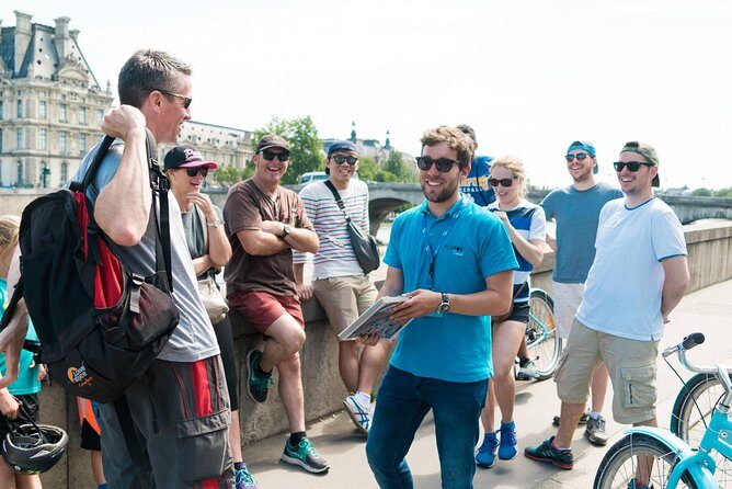Paris Highlights Bike Tour: Eiffel Tower, Louvre and Notre-Dame - The Eiffel Tower stop: photos now, tickets later